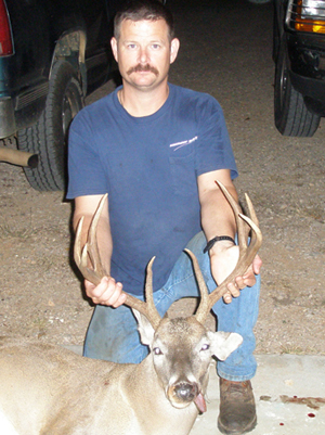 John Horrigan on a deer hunt with a bow