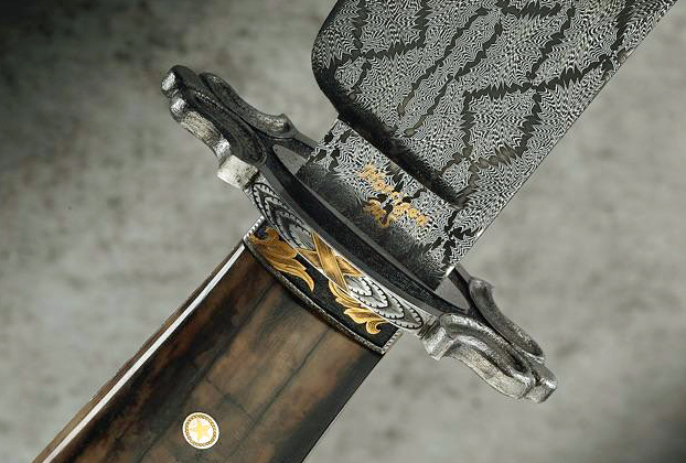 Elite Knives rattlesnake engraving