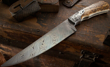 Elite Knives engraved hunting knife with mammoth ivory handle