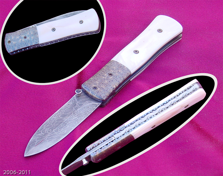 Damascus steel blade folding dirk with pink pearl handle