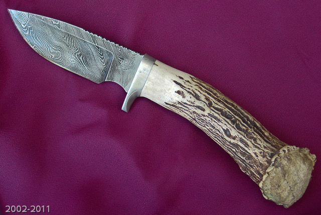 Drop Point Hunter with damascus steel blade