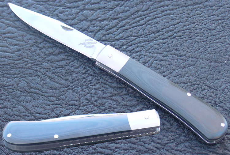 Rocket Handmade Knives        single blade "trapper" in black micarta